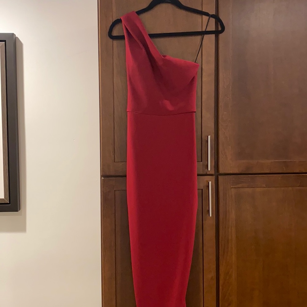 Long red dress with exposed zipper in the back